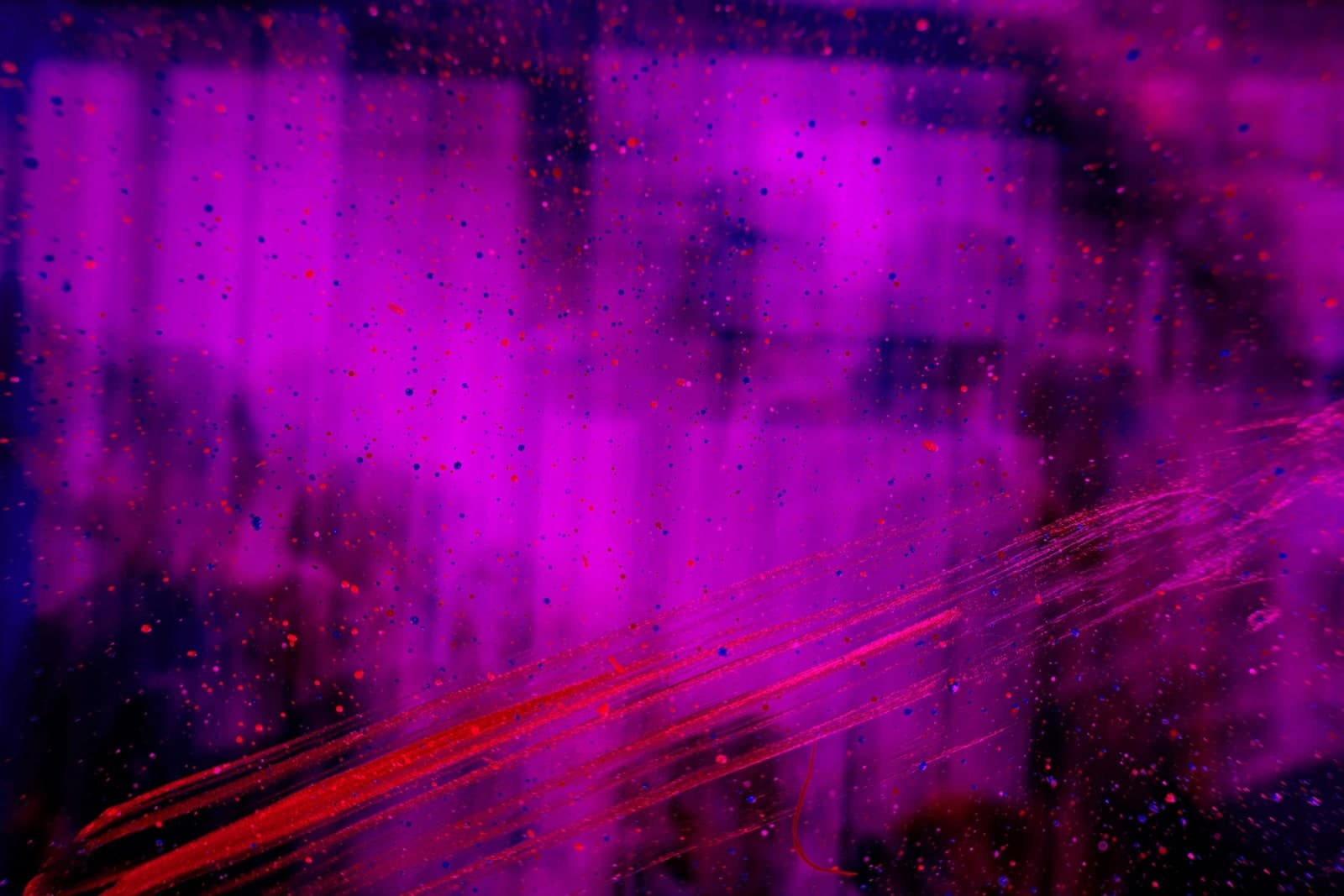 Purple and red city light abstraction for international expansion analysis.